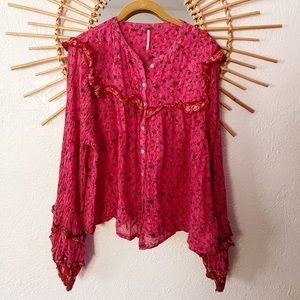 Pink free people long sleeve top with flowy sleeves!